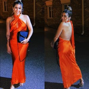 Red crisscross halter open back dress. Elegant and flattering